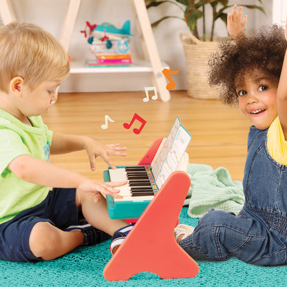 B. toys toddler musical instrument piano close up of multicolored keys with note letters A to G