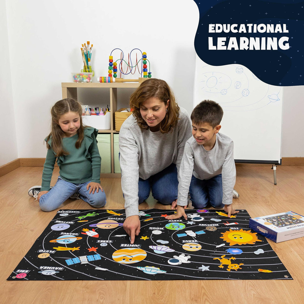 Educational astronomy kit packaging reference guide with dwarf planets and English name labels