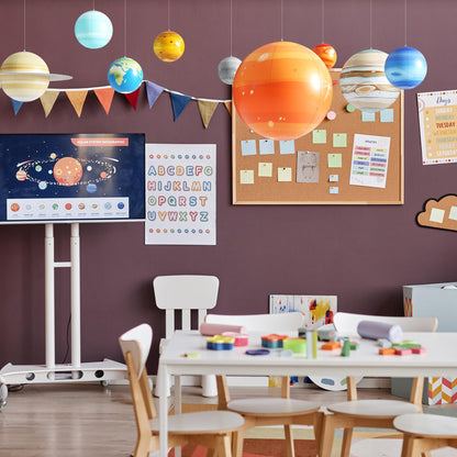 Dan&Darci giant inflatable sun and planets displayed as outer space themed party decorations.