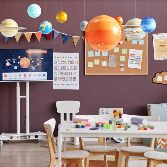 Dan&Darci giant inflatable sun and planets displayed as outer space themed party decorations.