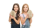 Children using the mallet and chisel tools to dig into the seven inch plaster dinosaur egg.