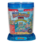 Close up view of the Sea Monkeys neon tank showing the ventilated lid design and the molded underwater seascape background base