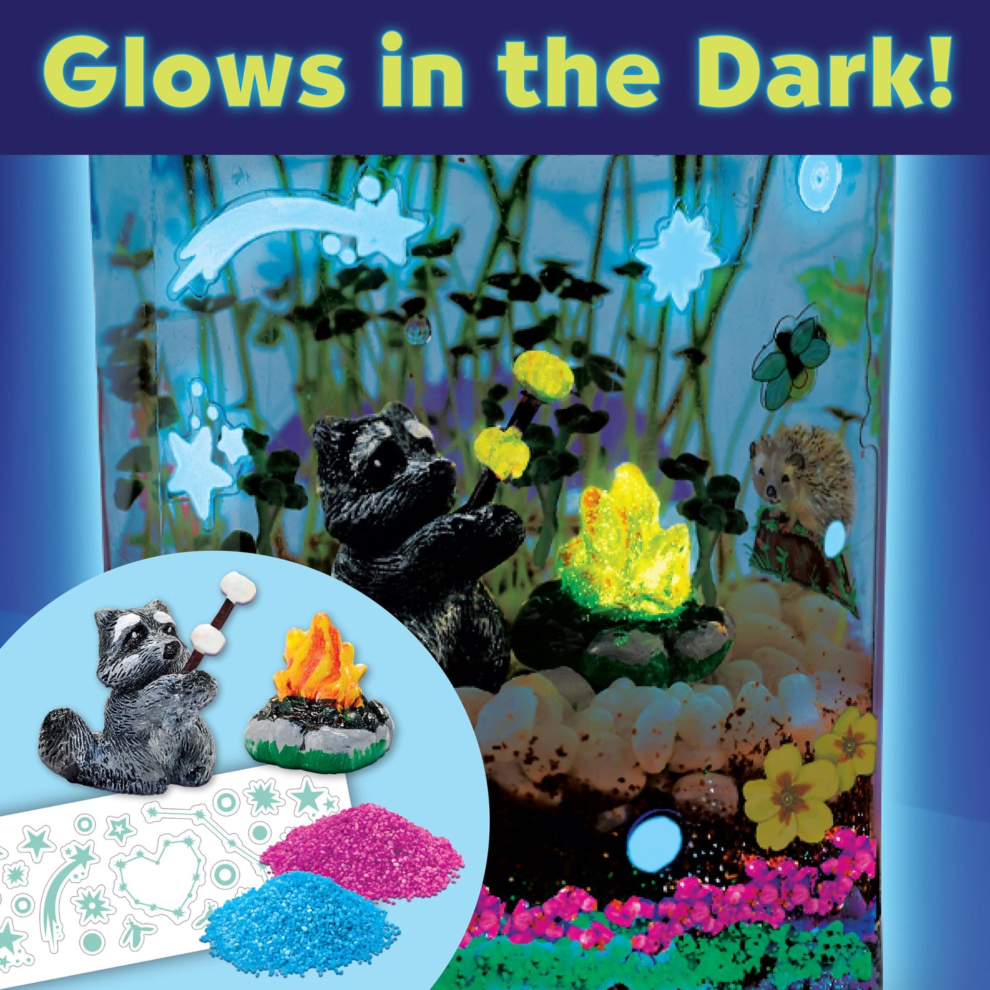 Assembled plastic mason jar terrarium filled with growing green wheatgrass sprouts, glowing sand layers, and miniature animal figurines.