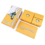 Arduino compatible STEM toy components including yellow wheels and microcontroller board spread out