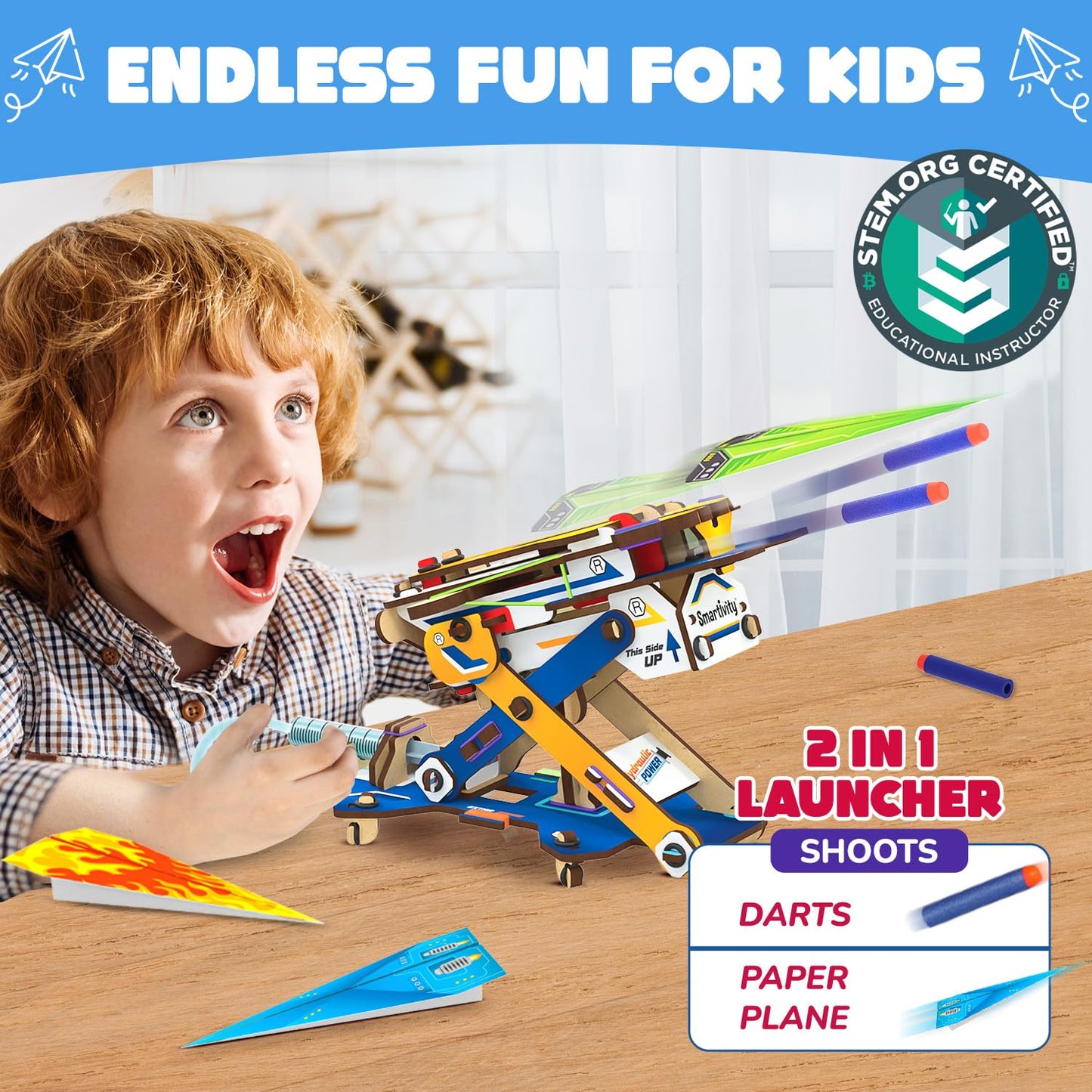 Side angle of the Smartivity hydraulic science toy showing water syringes and connected tubes