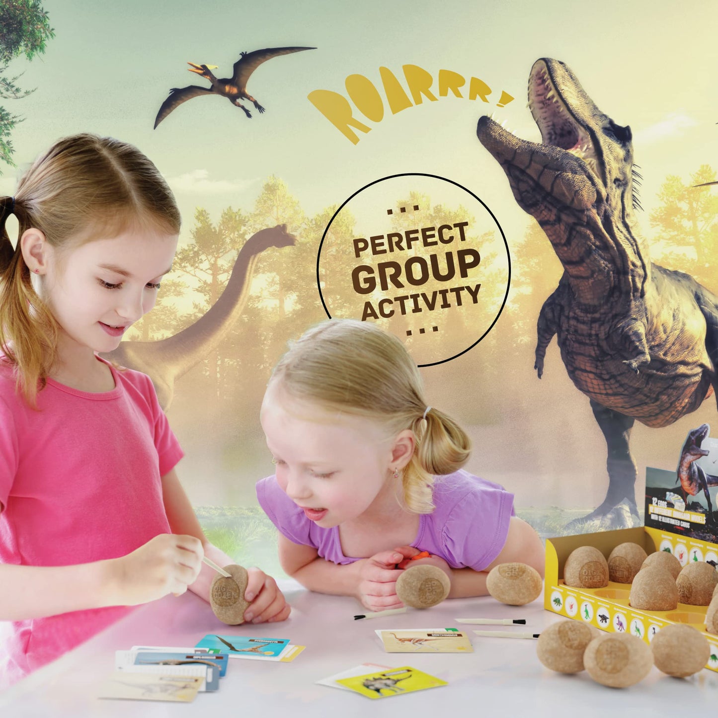 Children using paleontology tools to break open a softened plaster egg shell