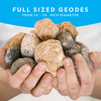 Child using a hammer safely to crack open a natural geode rock