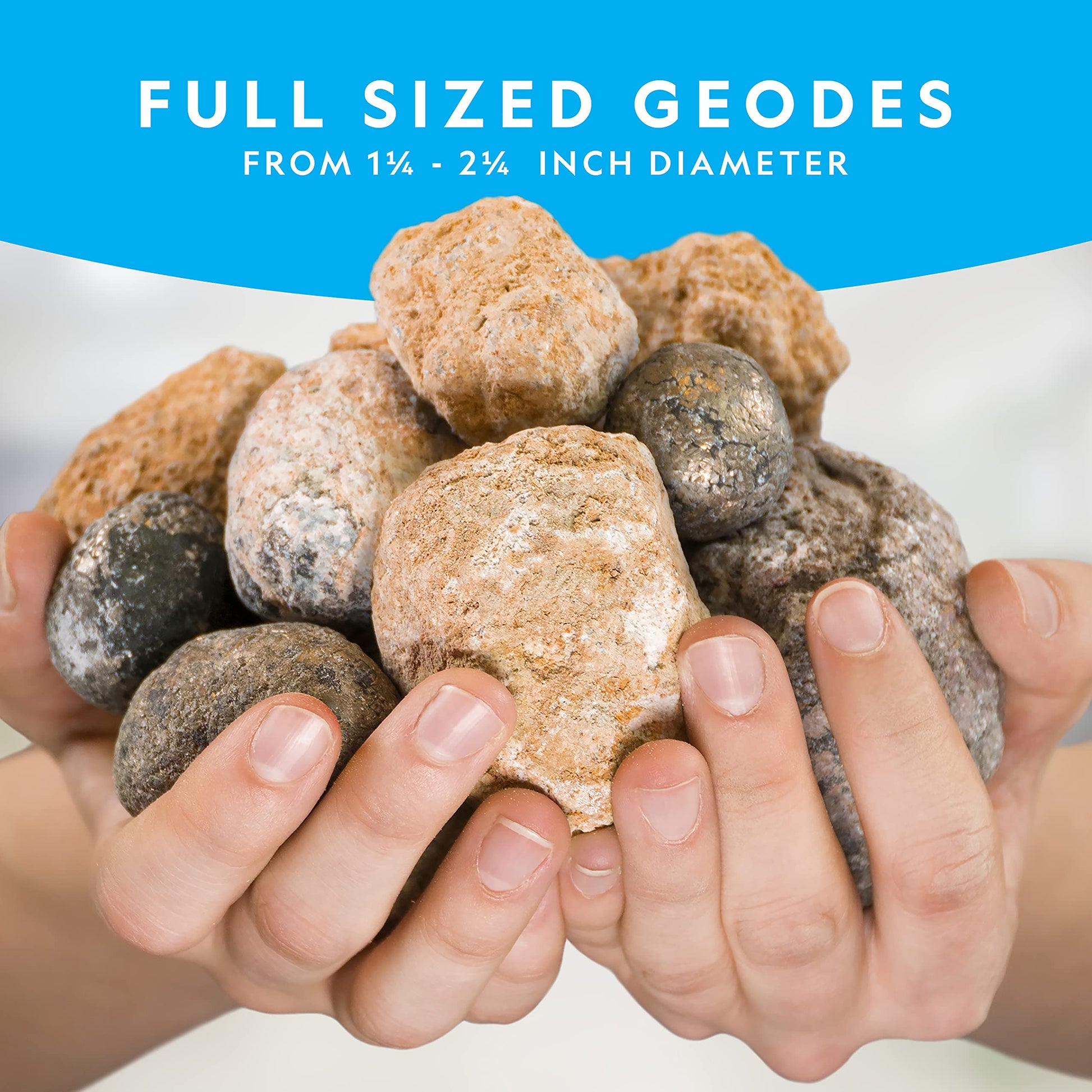 Child using a hammer safely to crack open a natural geode rock