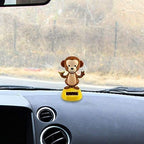 Two pieces of solar swinging monkey bobble toys for desk decoration