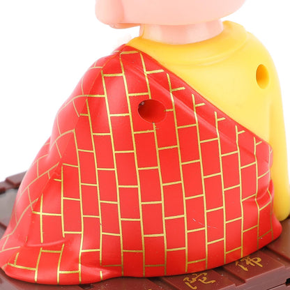 Tyenaza Solar Powered Bobblehead Buddha packaging view with included base dimensions.