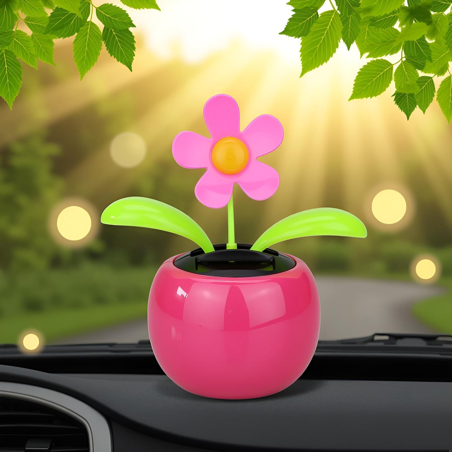 Solar powered swinging animated bobblehead flower sitting on a sunny office desk.