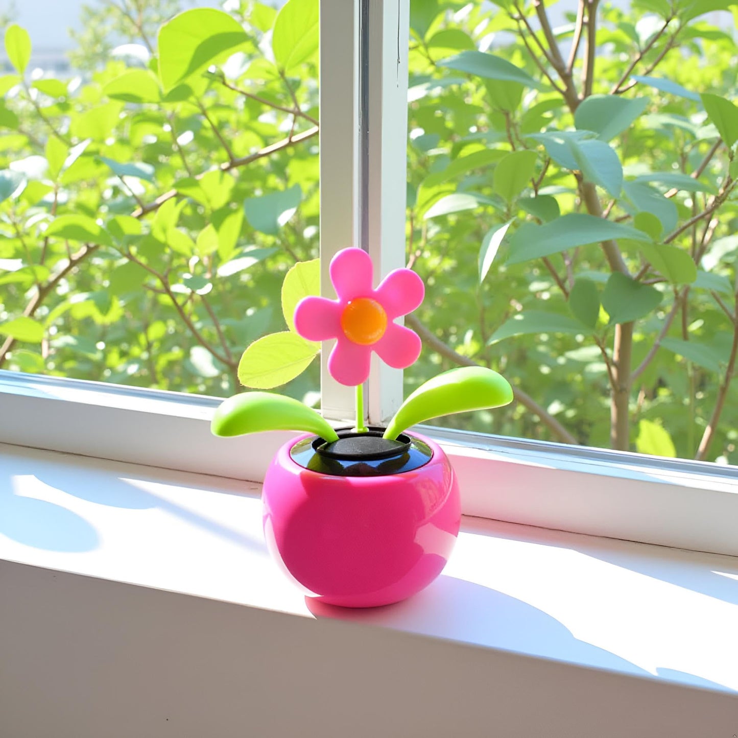 Charming pink floral bobblehead dancer dashboard decoration side view profile.
