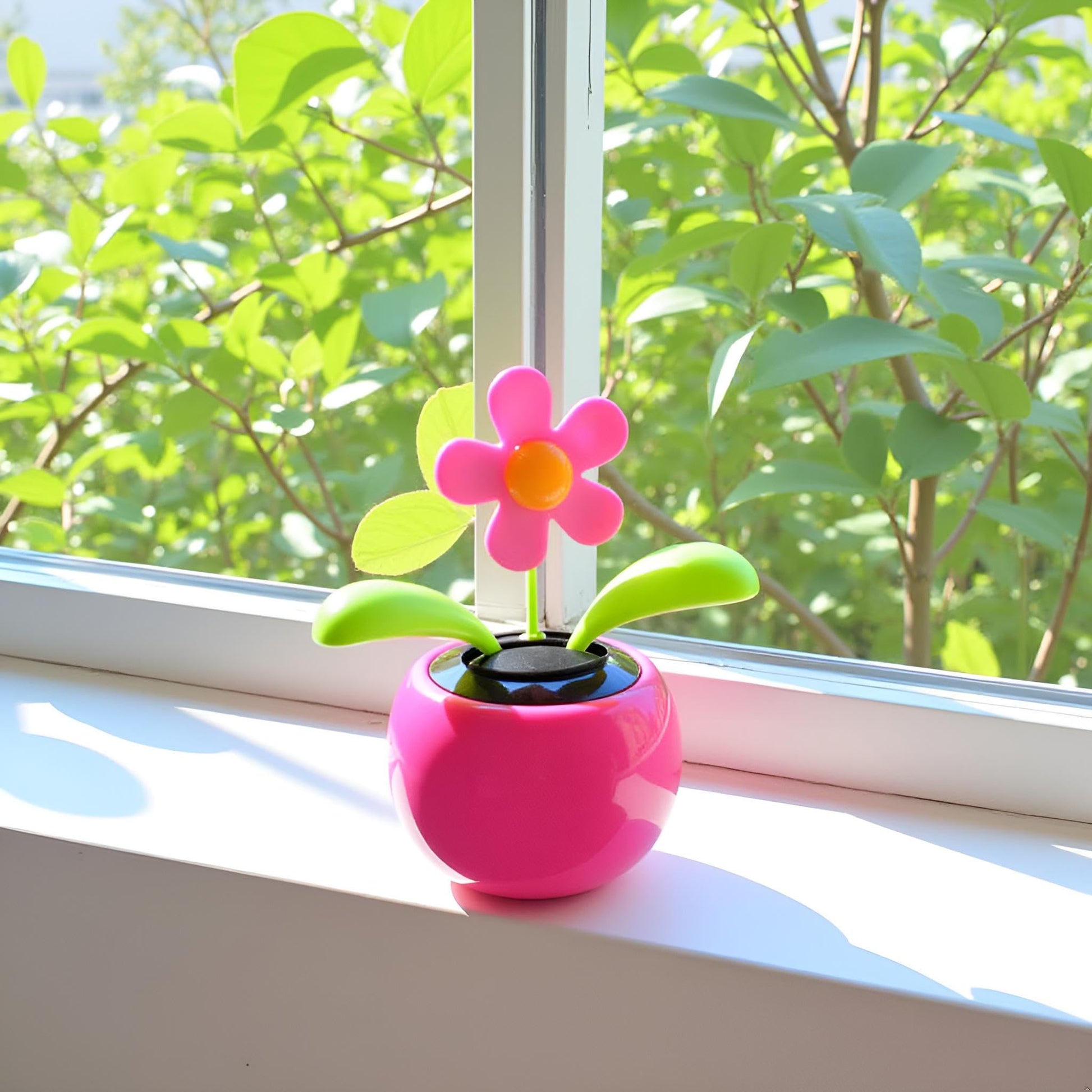 Charming pink floral bobblehead dancer dashboard decoration side view profile.