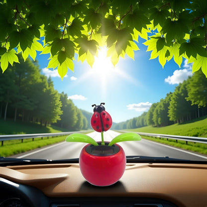 YuanHolumid solar ladybug bobblehead toy placed on a sunny vehicle dashboard displaying its compact size