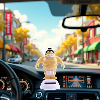 Close up view of the eco friendly solar dancing sumo figurine detailing the miniature design and sturdy white base.