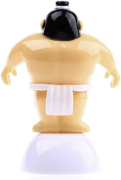 Detailed look at the photovoltaic cell on the PurYupearl sumo wrestler figurine base that powers the swinging motion.