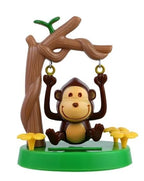 Cute solar monkey swinging animated bobble dancer on car interior panel
