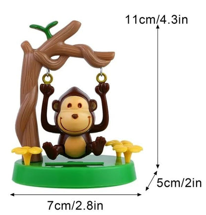 Eco friendly solar powered swinging monkey figurine close up view