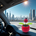 Solar powered swinging flower pot ornament for automobile interior decoration