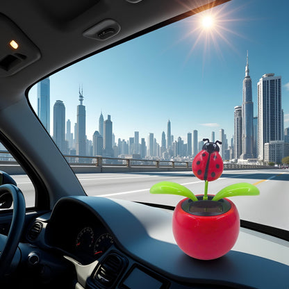 Solar powered swinging flower pot ornament for automobile interior decoration