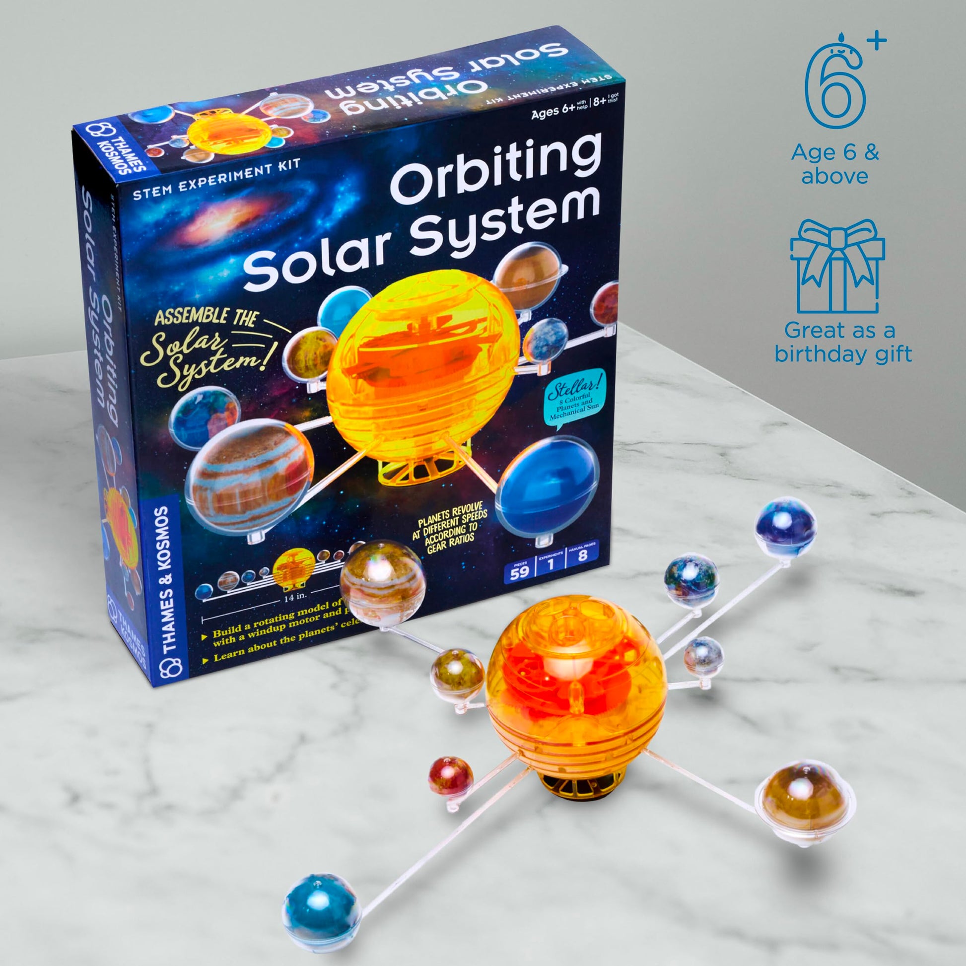 Thames & Kosmos Orbiting Solar System kit showing fifty nine colorful snap together plastic planet and gear pieces