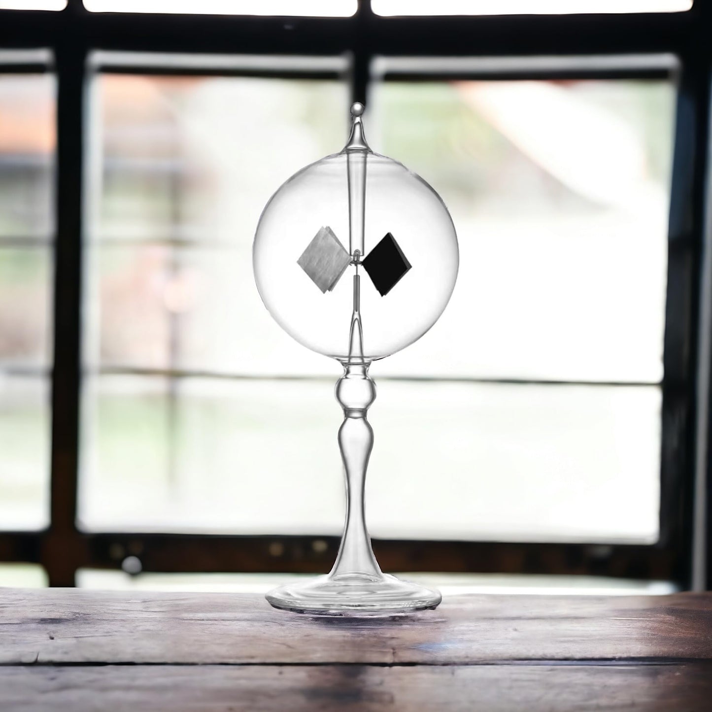 DORAMI clear glass physics teaching tool radiometer exposed to sunlight