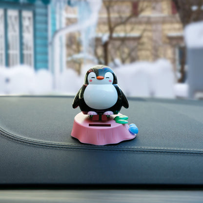 YGMONER penguin bobblehead accessory showing durable eco friendly ABS plastic construction details