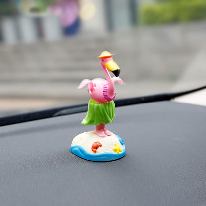 YGMONER animated bobble dancer flamingo dashboard decor showing the integrated solar panel on the base