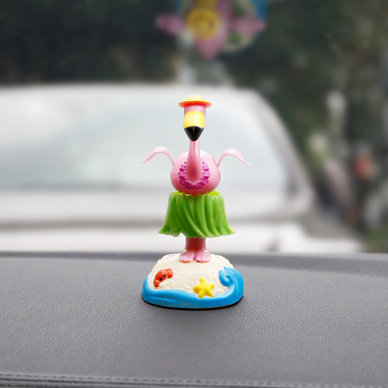 YGMONER swinging dress flamingo car ornament displaying the detailed yellow sun hat and small starfish accessory