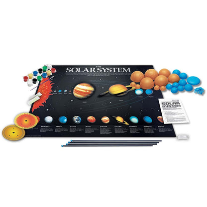 Unboxed components including snap-together planets paint strips glow paint and brush