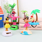 Close up view of the integrated solar strip on the base of the tropical bobblehead doll
