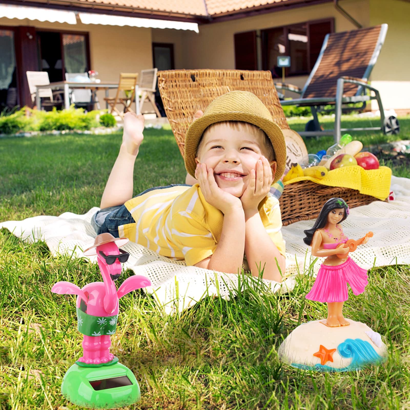 Durable multi colored plastic flamingo solar toy with flapping wings exposed to sunlight