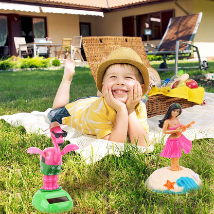 Durable multi colored plastic flamingo solar toy with flapping wings exposed to sunlight