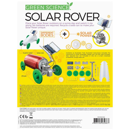 Young child carefully assembling the alternative energy solar panel wires onto the 4M Green Science educational vehicle.