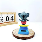 Compact eleven centimeter solar animal toy placed on a sunny windowsill