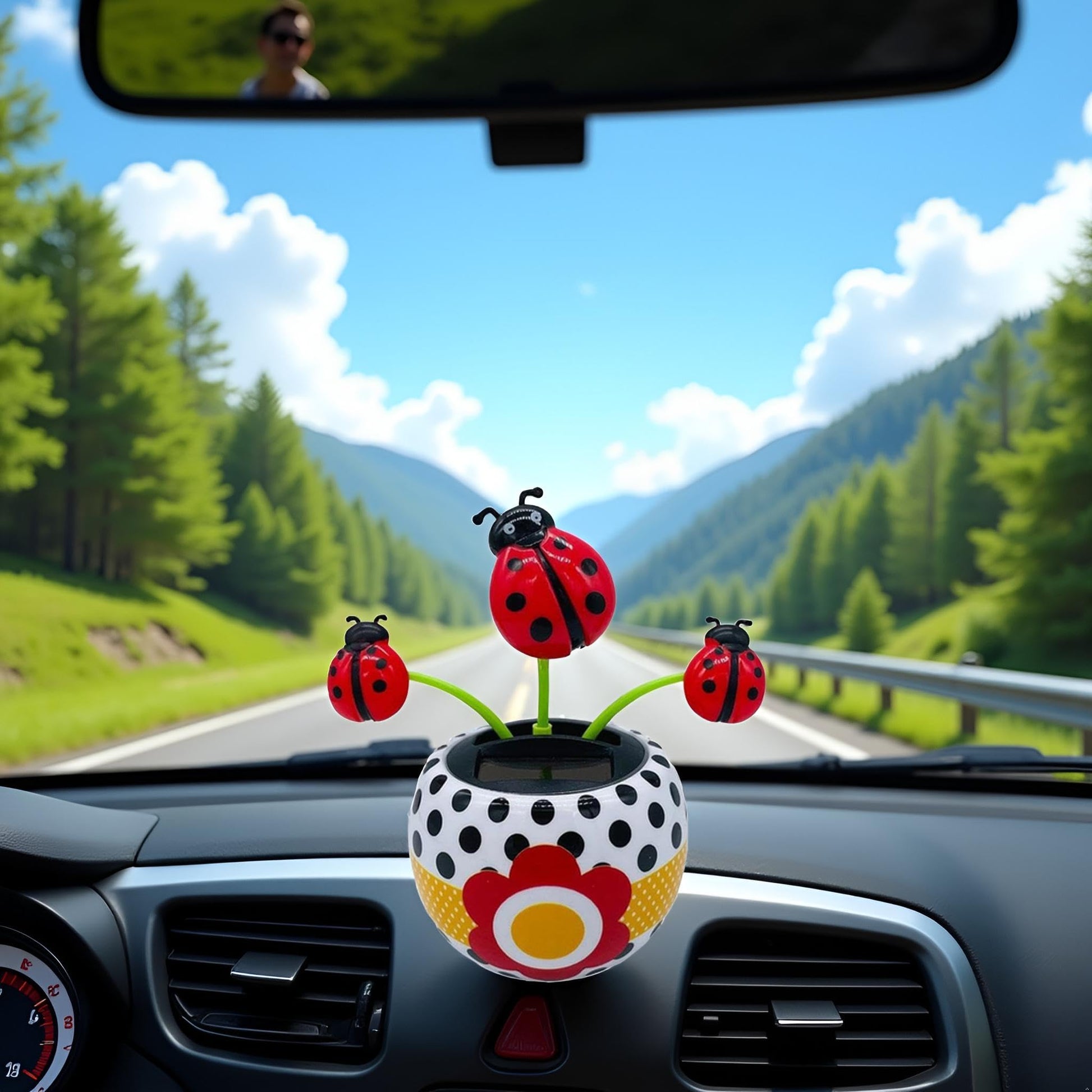 Close up of the solar panel base on the ladybug swinging dashboard figurine.