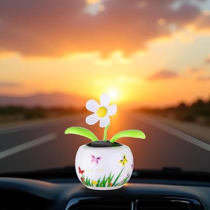 Compact solar powered moving plant toy for office desk styling