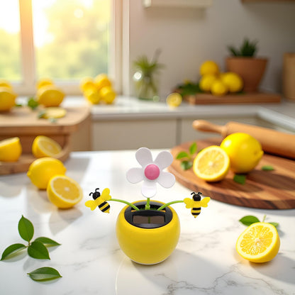 SquarezhenBo solar powered dancing daisy placed on a sunny car dashboard as a decoration