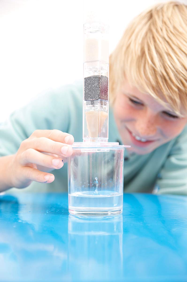 Clear water dripping through the filter paper section of the educational science toy.