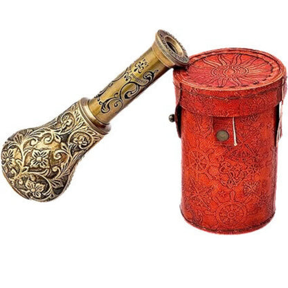 Handmade maritime brass telescope collectible displayed elegantly on a modern wooden office desk.
