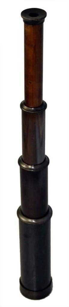 Close up view of the glass eyepiece and detailed antique metal craftsmanship of the captain telescope