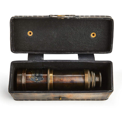 Super7One V.Empire Handcrafted Brass Nautical Telescope displayed as a vintage maritime decorative centerpiece on a wooden desk.