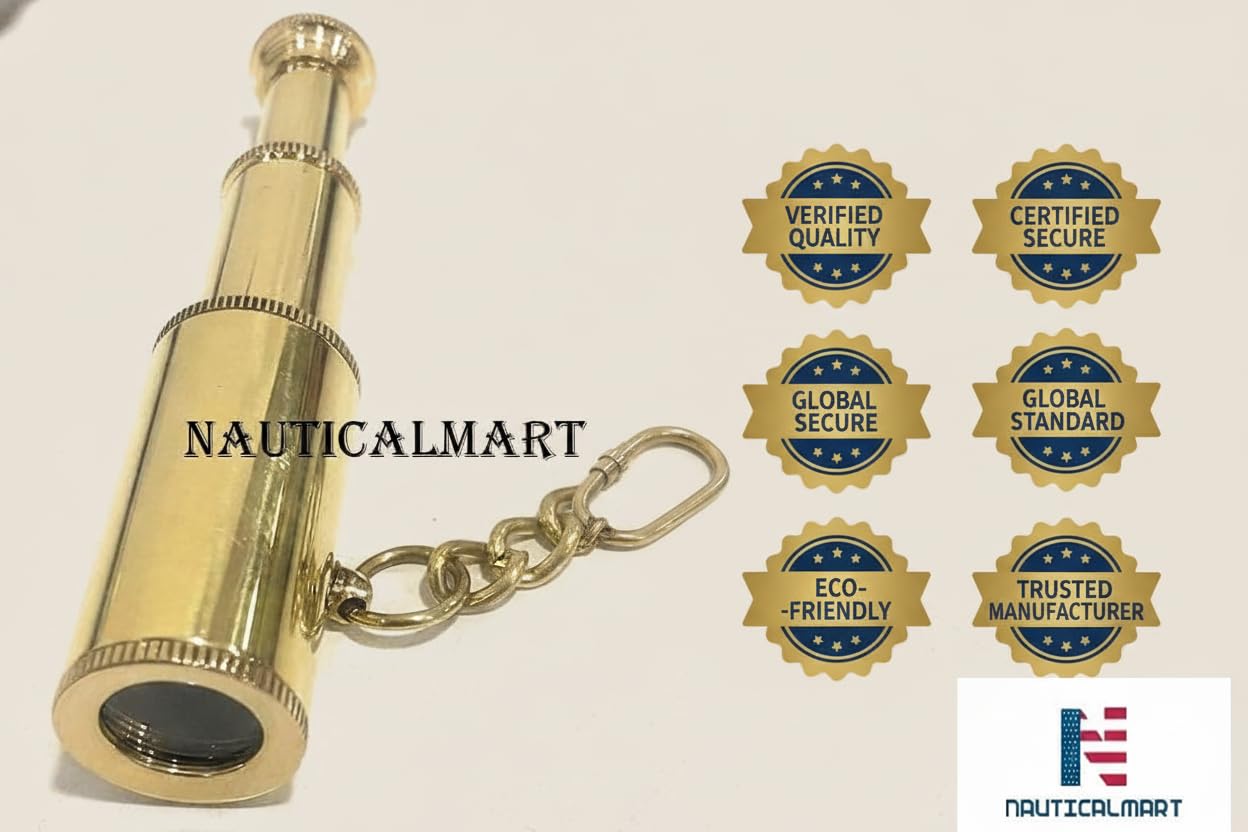 Premium handcrafted NauticalMart solid brass marine spyglass pocket key ring displayed flat on a wood surface.