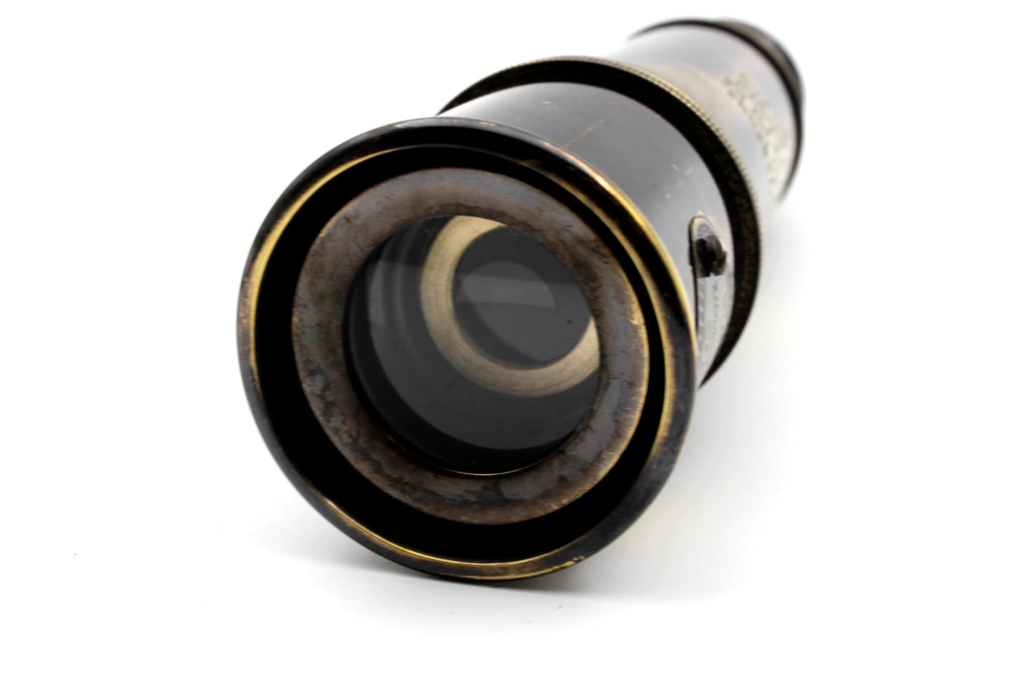 US HANDICRAFTS fifteen inch nautical telescope fully extended on a decorative table