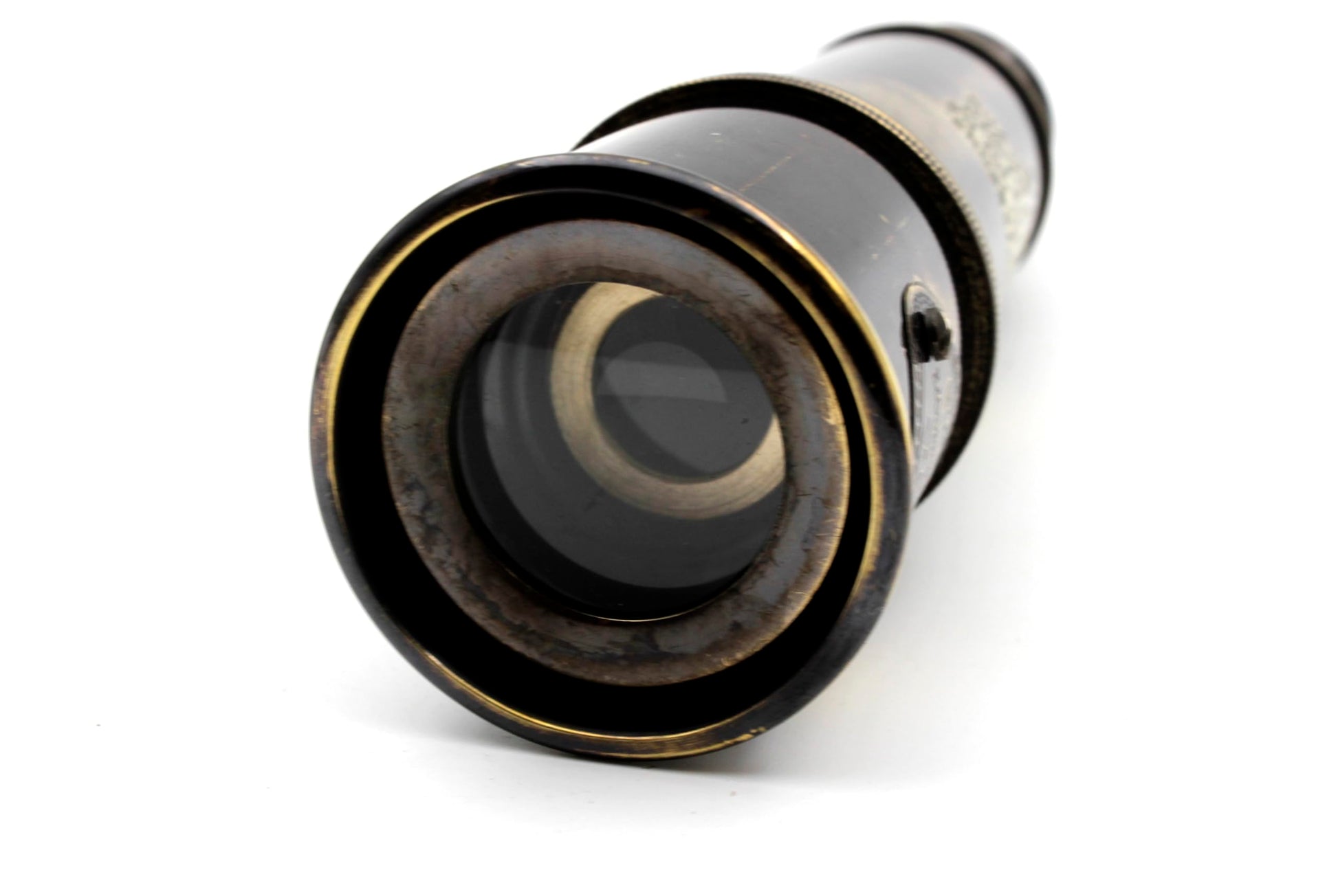 US HANDICRAFTS fifteen inch nautical telescope fully extended on a decorative table