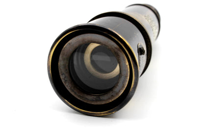US HANDICRAFTS fifteen inch nautical telescope fully extended on a decorative table