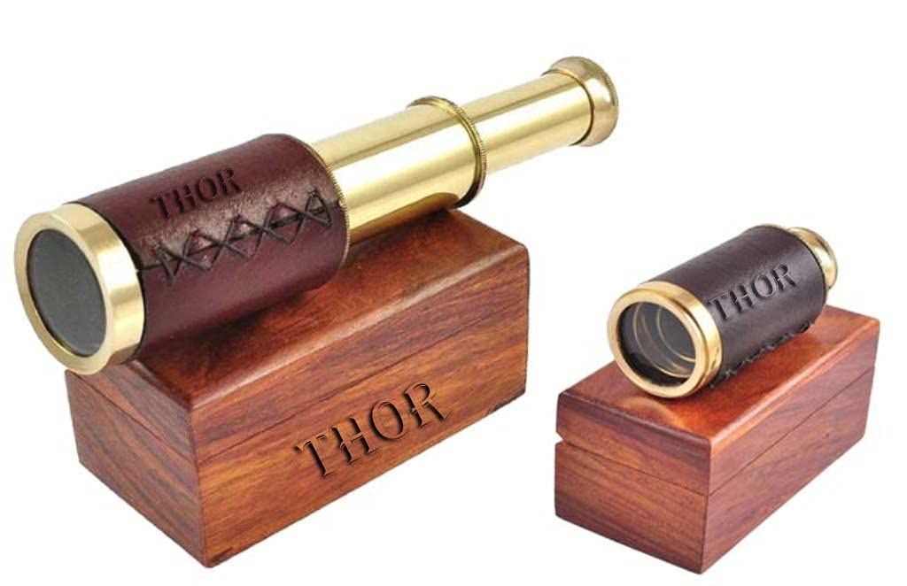 Handcrafted pirate nautical telescope extended fully showcasing the segmented brass optical tube design