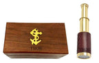 Thor Instruments six inch brass telescope securely packed inside the closed anchor embossed wooden chest