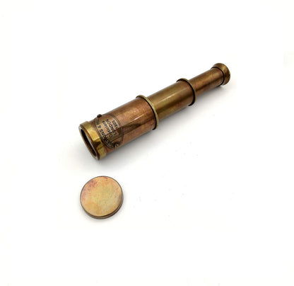 Close up of solid brass and alloy craftsmanship on vintage telescope