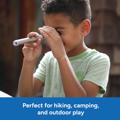 GeoSafari science toy being held by a child exploring outdoors.